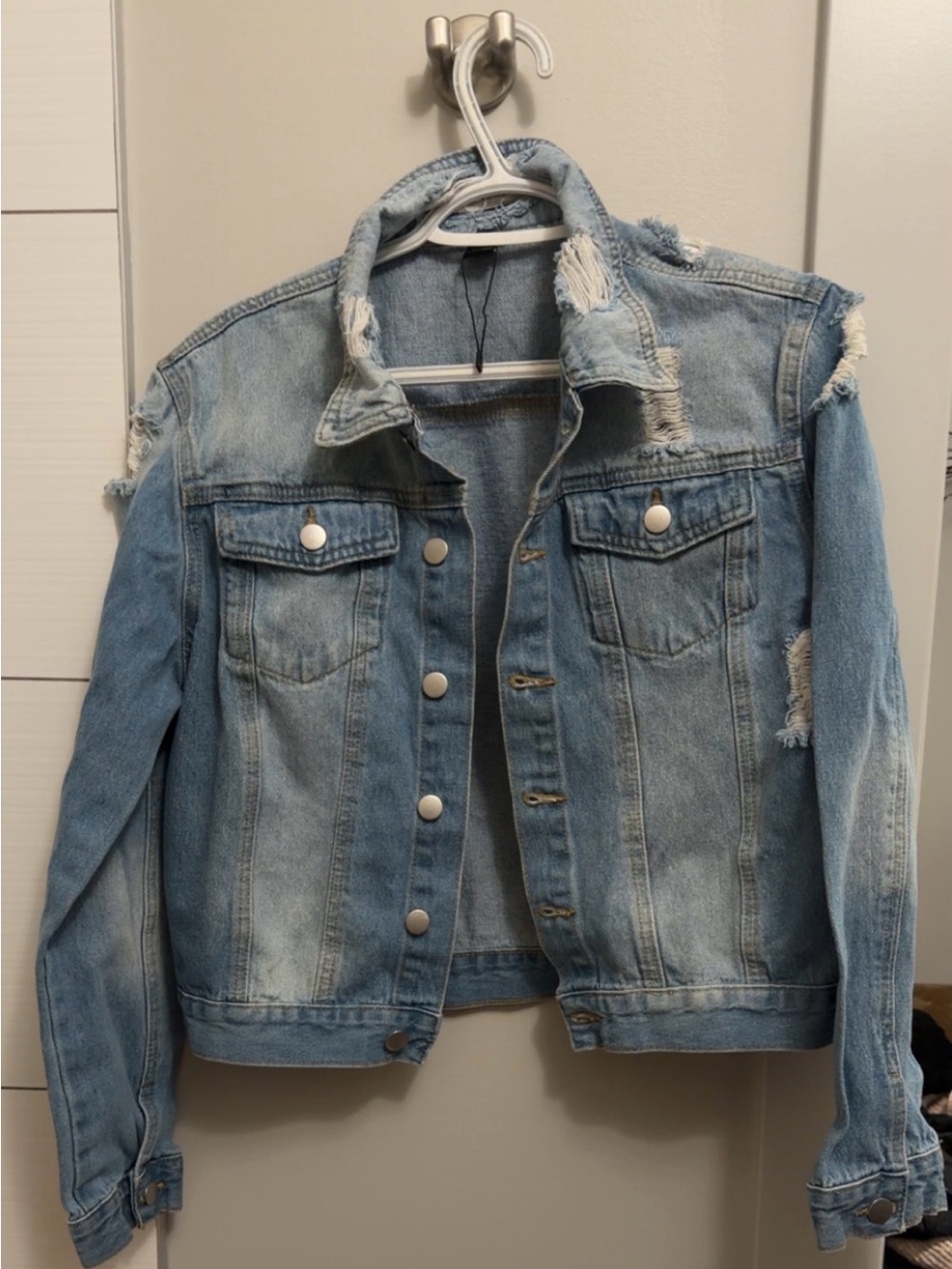 Light Blue Distressed Denim Jacket Size Large. Never Worn